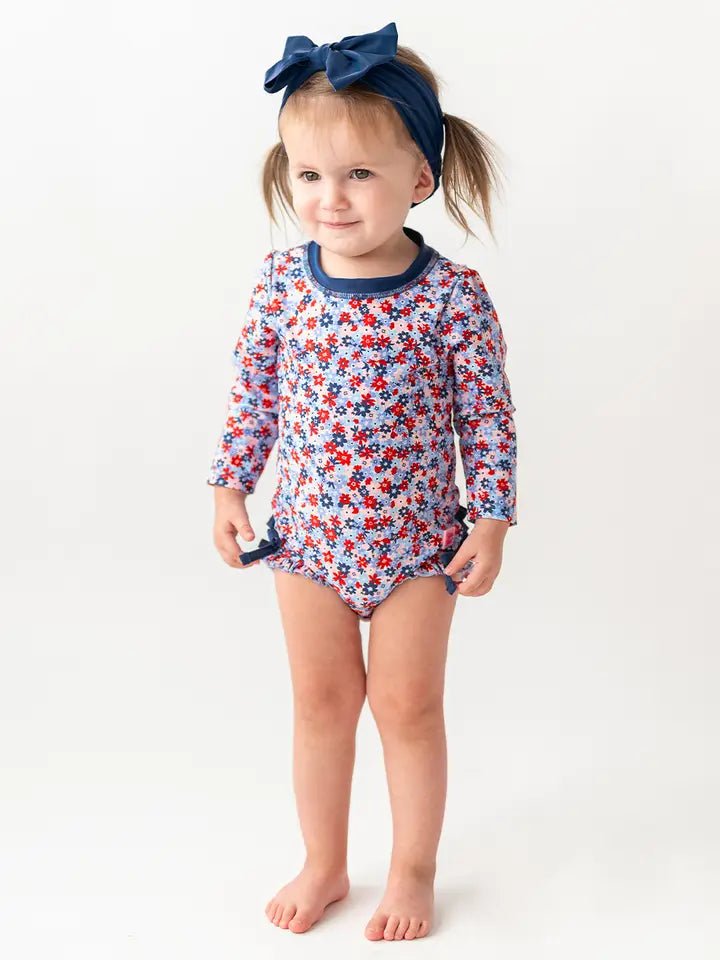 Ruffle/Rugged Butts: Red White and Bloom One Piece Long Sleeve Rashguard Swimsuit